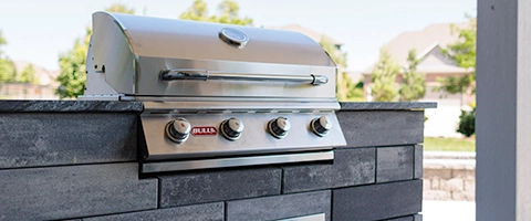 Custom outdoor kitchen with grill near Omaha, NE.