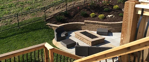 Rectangular custom fire pit and patio area in Waterloo, NE.